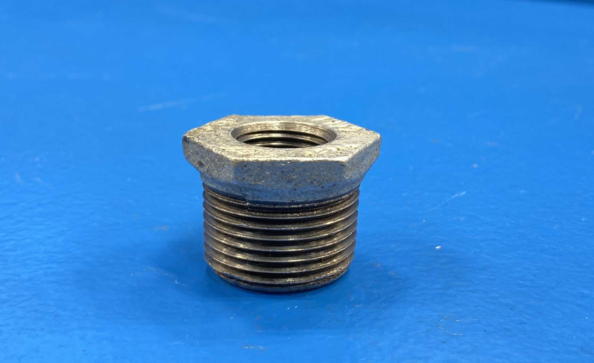 Mueller Comercial 511-953L Galvanized Malleable Iron Hex Reducing Bushing 1" Male x 1/2" Female NPT