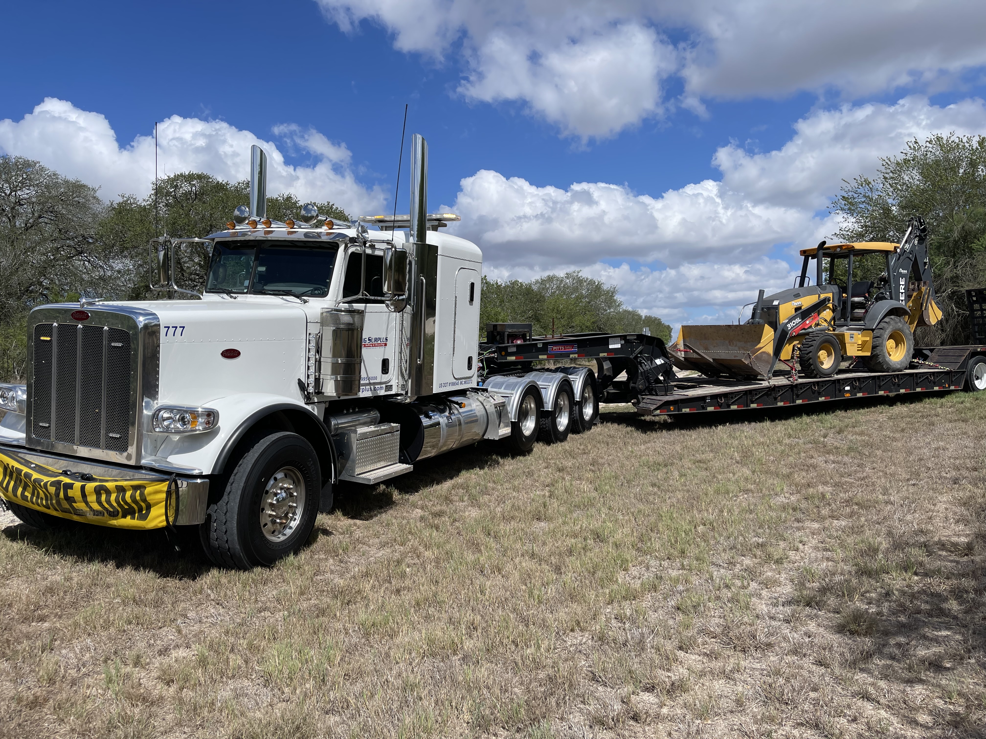 Backhoe, gooseneck transport