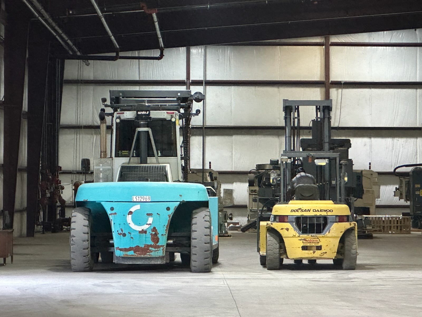 Forklifts, staged